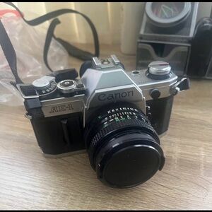 Canon AE-1 35mm Film Camera + 50mm + 70–210mm Lens Bundle